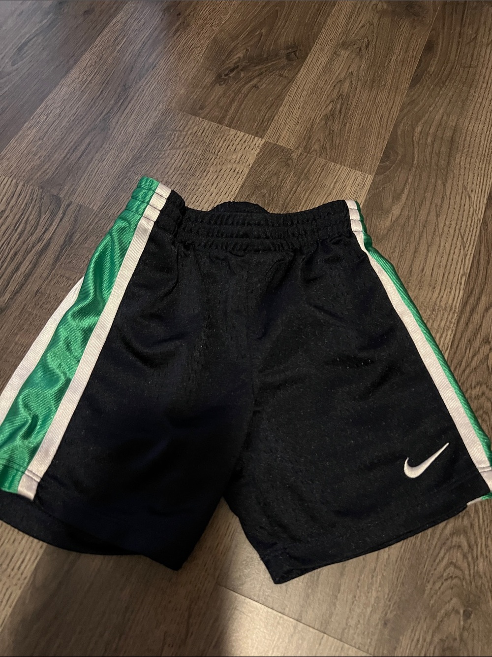 Nike Kids Black Shorts with Green and White Side Panels
